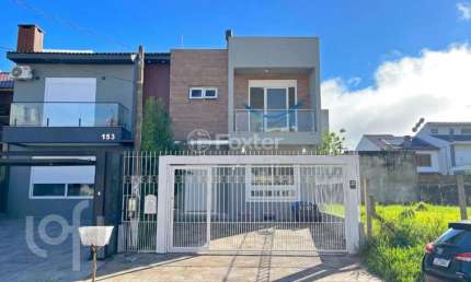 Casa com 3 quartos à venda na Rua Aldo Sani, 143, Hípica, Porto Alegre, 127 m2 por R$ 699.000