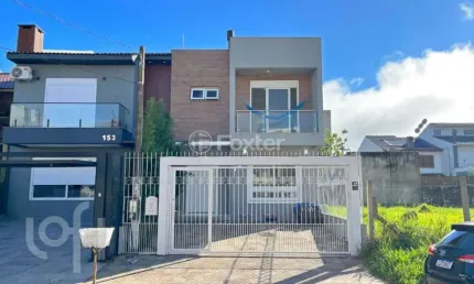Casa com 3 quartos à venda na rua aldo sani, 143, hípica, porto alegre, 127 m2 por r$ 699.000