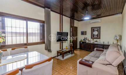 Casa com 3 quartos à venda na Rua Coelho Neto, 844, Sumaré, Alvorada, 125 m2 por R$ 451.250