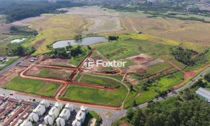Terreno em condomínio fechado à venda na Avenida Hispânica, 495, Guajuviras, Canoas, 200 m2 por R$ 110.000