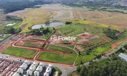 Terreno em condomínio fechado à venda na Avenida Hispânica, 495, Guajuviras, Canoas, 200 m2 por R$ 110.000