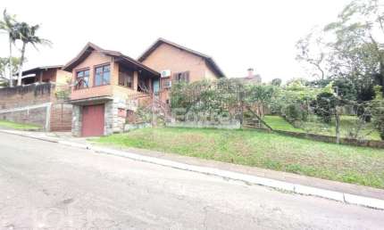 Casa com 3 quartos à venda na Rua Epitácio Pessoa, 745, Primavera, Novo Hamburgo, 326 m2 por R$ 1.290.000