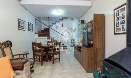 Casa em condomínio fechado com 3 quartos à venda na Avenida Arnaldo Bohrer, 184, Teresópolis, Porto Alegre, 107 m2 por R$ 590.000