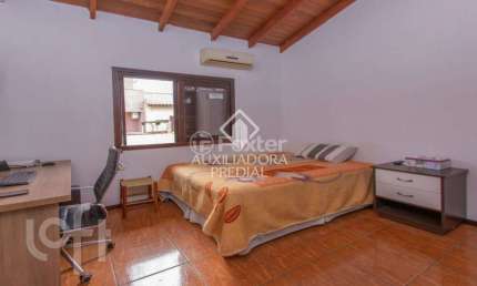 Casa com 3 quartos à venda na Rua Vacaria, 74, Hípica, Porto Alegre, 129 m2 por R$ 590.000