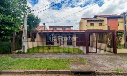 Casa com 4 quartos à venda na Rua Ítalo Brutto, 430, Espírito Santo, Porto Alegre, 161 m2 por R$ 750.000