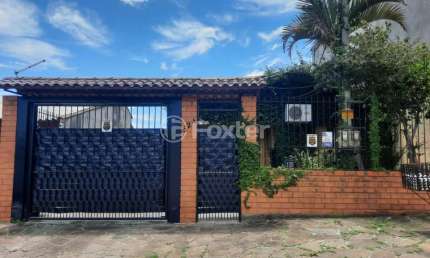 Casa com 3 quartos à venda na Rua Felipe Camarão, 524, Formoza, Alvorada, 330 m2 por R$ 450.000