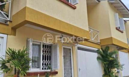 Casa em condomínio fechado com 3 quartos à venda na Rua Barbosa Neto, 205, Cavalhada, Porto Alegre, 129 m2 por R$ 570.000