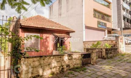 Casa com 3 quartos à venda na Rua Comendador Rheingantz, 61, Auxiliadora, Porto Alegre, 296 m2 por R$ 900.000