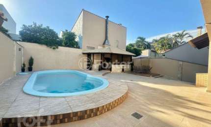 Casa com 4 quartos à venda na Rua São Caetano, 58, Marechal Rondon, Canoas, 257 m2 por R$ 1.890.000