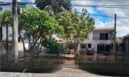 Casa com 3 quartos à venda na Rua Buttenbender, 109, Fátima, Canoas, 221 m2 por R$ 520.000