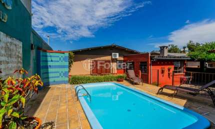 Casa em condomínio fechado com 3 quartos à venda na Avenida Edgar Pires de Castro, 2603, Hípica, Porto Alegre, 148 m2 por R$ 636.000