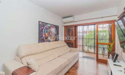 Casa com 3 quartos à venda na Rua José Carlos de Souza Lobo, 52, Parque Santa Fé, Porto Alegre, 114 m2 por R$ 440.000