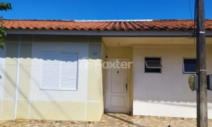 Casa em condomínio fechado com 2 quartos à venda na Rua Lino Estácio dos Santos, 1535, Cadiz, Gravataí, 43 m2 por R$ 220.000