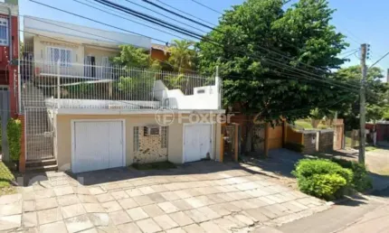 Casa com 3 quartos à venda na Rua Doutor Barbosa Gonçalves, 41, Chácara das Pedras, Porto Alegre, 141 m2 por R$ 900.000