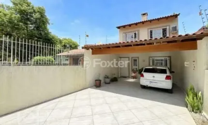 Casa com 3 quartos à venda na Rua Luiz Batista Bertaco, 41, Serraria, Porto Alegre, 136 m2 por R$ 349.000