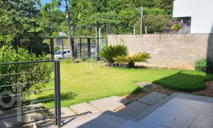 Casa com 3 quartos à venda na Rua Doutor Sérgio de Figueiredo, 300, Guarujá, Porto Alegre, 293 m2 por R$ 1.272.000