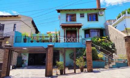 Casa com 3 quartos à venda na Rua Doutor Francisco de Sá Brito, 240, Partenon, Porto Alegre, 266 m2 por R$ 1.100.000