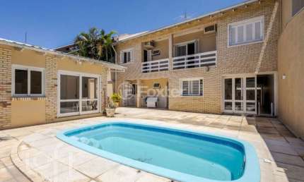 Casa com 5 quartos à venda na Rua Escócia, 51, Marechal Rondon, Canoas, 261 m2 por R$ 2.150.000