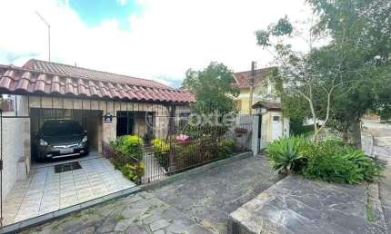 Casa com 4 quartos à venda na Rua Monte Flor, 270, Jardim Floresta, Porto Alegre, 154 m2 por R$ 490.000