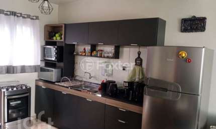 Casa em condomínio fechado com 2 quartos à venda na Rua Doutor Karl Wilhelm Schinke, 1376, Rondônia, Novo Hamburgo, 59 m2 por R$ 249.000