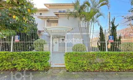 Casa com 3 quartos à venda na Rua Luiz Delfino, 99, Espírito Santo, Porto Alegre, 182 m2 por R$ 749.000