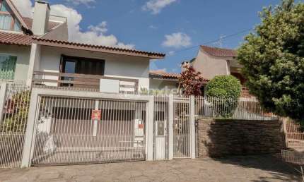 Casa com 4 quartos à venda na Rua Maestro Salvador Campanella, 58, Jardim Itu Sabará, Porto Alegre, 198 m2 por R$ 995.000