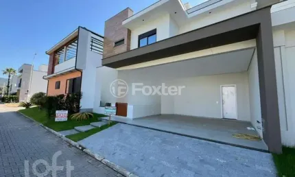 Casa em condomínio fechado com 3 quartos à venda na Avenida Deltaville, 46, Beira Rio, Biguaçu, 176 m2 por R$ 1.200.000