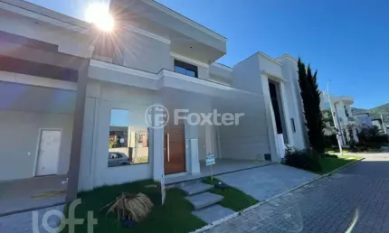 Casa em condomínio fechado com 3 quartos à venda na Avenida Deltaville, 47, Beira Rio, Biguaçu, 176 m2 por R$ 1.200.000