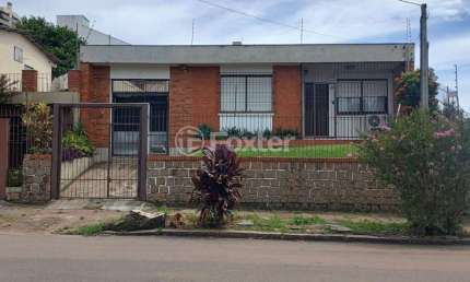 Casa com 4 quartos à venda na Rua Aneron Corrêa de Oliveira, 160, Jardim do Salso, Porto Alegre, 179 m2 por R$ 717.000