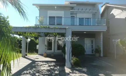 Casa em condomínio fechado com 4 quartos à venda na Avenida Senador Salgado Filho, 54, Querência, Viamão, 273 m2 por R$ 1.280.000