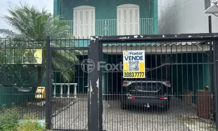 Casa com 4 quartos à venda na Rua Hermínio Machado, 653, Jardim Algarve, Alvorada, 192 m2 por R$ 490.000