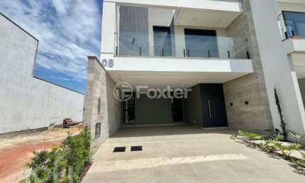 Casa em condomínio fechado com 3 quartos à venda na Avenida Wilson Castelo Branco, 373, Beira Rio, Biguaçu, 195 m2 por R$ 1.060.000