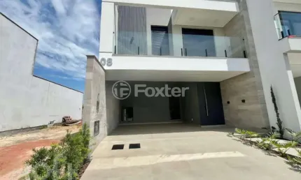Casa em condomínio fechado com 3 quartos à venda na Avenida Wilson Castelo Branco, 373, Beira Rio, Biguaçu, 195 m2 por R$ 1.060.000
