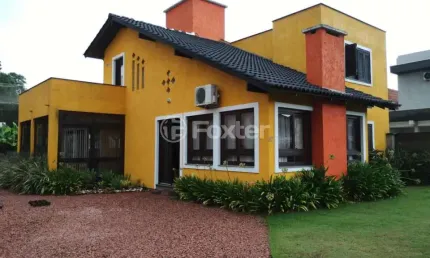 Casa em condomínio fechado com 3 quartos à venda na Rua Grápia, 97, São Lucas, Viamão, 148 m2 por R$ 750.000