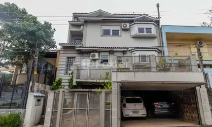Casa com 4 quartos à venda na Rua Bortolo Barbieri, 67, Jardim São Pedro, Porto Alegre, 400 m2 por R$ 1.700.000