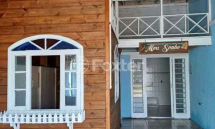 Casa com 3 quartos à venda na Avenida Caravelas, 217, Enseada de Brito, Palhoça, 240 m2 por R$ 565.000