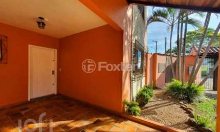 Casa em condomínio fechado com 3 quartos à venda na Rua Aracy Barcelos Fonseca, 68, Oriço, Gravataí, 149 m2 por R$ 390.000