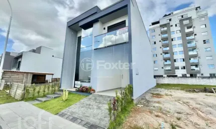 Casa em condomínio fechado com 3 quartos à venda na Avenida Wilson Castelo Branco, 389, Beira Rio, Biguaçu, 154 m2 por R$ 1.149.000