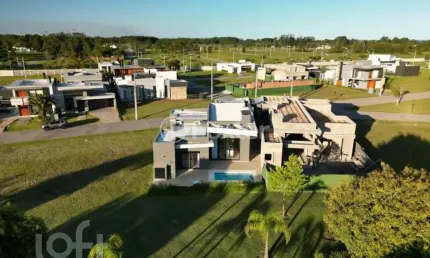 Casa em condomínio fechado com 4 quartos à venda na Rua Manoel Quadros, 1, Centro, Capão da Canoa, 220 m2 por R$ 1.970.000