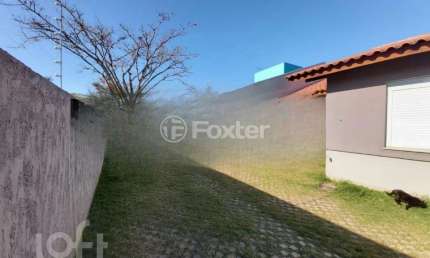 Casa em condomínio fechado com 2 quartos à venda na Rua Santa Mônica, 404, Ponta Grossa, Porto Alegre, 60 m2 por R$ 212.000