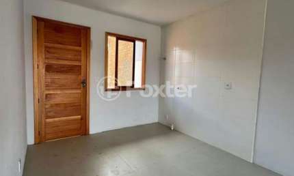 Casa em condomínio fechado com 2 quartos à venda na Rua Dalva de Oliveira, 272, Neópolis, Gravataí, 48 m2 por R$ 225.000
