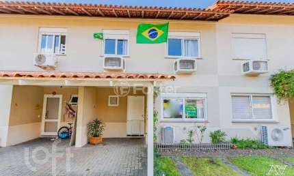 Casa com 3 quartos à venda na Rua Doutor Tancredo Neves, 160, Fátima, Canoas, 92 m2 por R$ 488.000