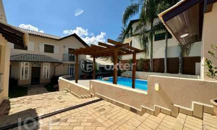 Casa com 4 quartos à venda na Rua Édio Ortiga Fedrigo, 51, Centro, Florianópolis, 317 m2 por R$ 2.000.000