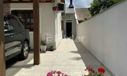 Casa com 3 quartos à venda na Rua Stringhini, 99, Hípica, Porto Alegre, 154 m2 por R$ 595.000