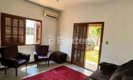 Casa com 4 quartos à venda na Travessa Antilhas, 73, Piratini, Sapucaia do Sul, 181 m2 por R$ 392.000