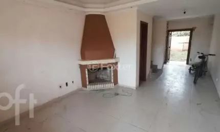Casa com 3 quartos à venda na Rua Waldemar da Silva Tavares, 210, Guarujá, Porto Alegre, 108 m2 por R$ 450.000