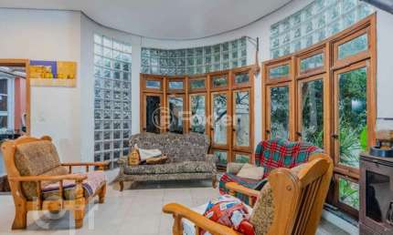 Casa em condomínio fechado com 6 quartos à venda na Rua Carlos Ferreira, 130, Teresópolis, Porto Alegre, 496 m2 por R$ 850.000