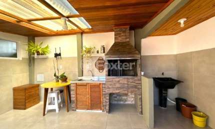 Casa com 3 quartos à venda na Rua Irmâ Arsênia Erthal, 61, Jardim Algarve, Alvorada, 161 m2 por R$ 475.000