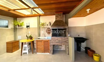 Casa com 3 quartos à venda na Rua Irmâ Arsênia Erthal, 61, Jardim Algarve, Alvorada, 161 m2 por R$ 475.000