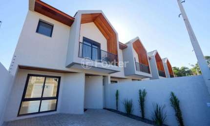 Casa em condomínio fechado com 3 quartos à venda na Rua Professora Delphina Ferrari, 236, Igara, Canoas, 124 m2 por R$ 720.000